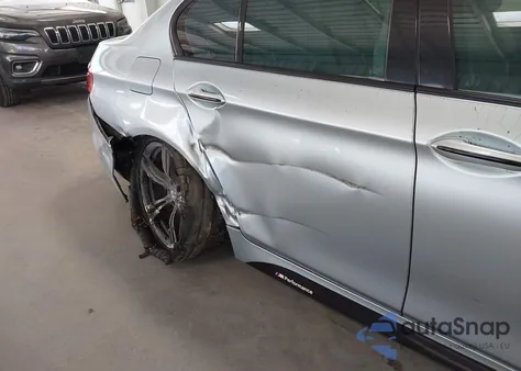 2014 BMW M5 z USA, uszkodzony, nr VIN WBSFV9C57ED097794